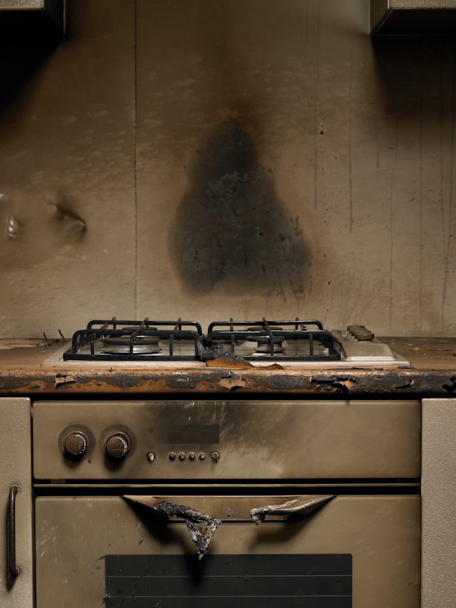 Smoke damaged kitchen cooker and counter top